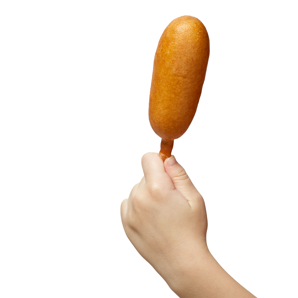 Hand holding up a corndog.